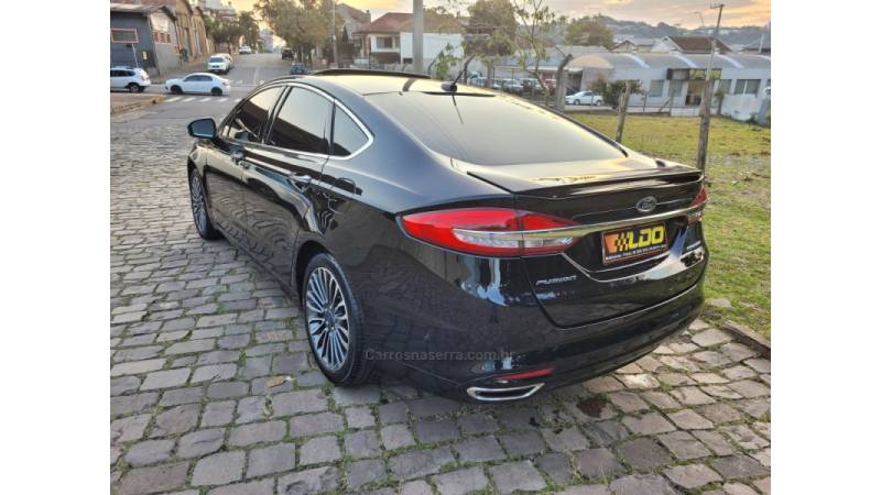 FORD - FUSION - 2016/2017 - Preta - R$ 109.990,00